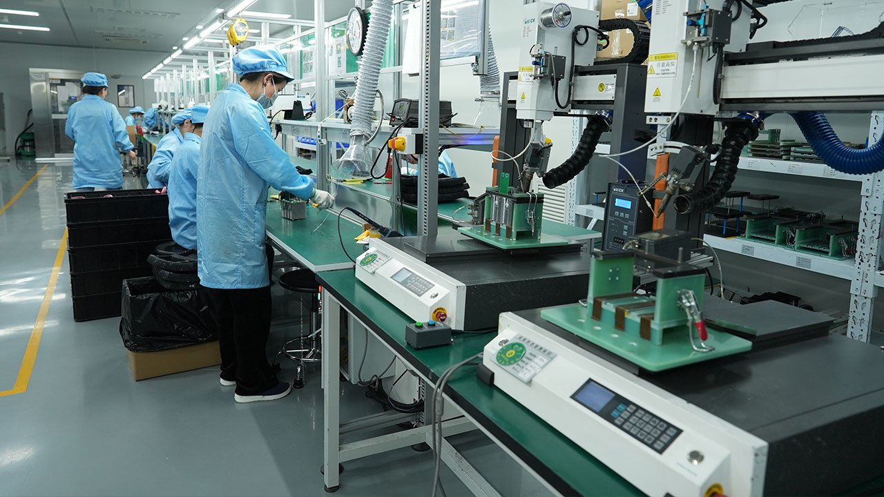 Automatic soldering machine at Ikonmac factory ensuring precision PCB assembly for power systems