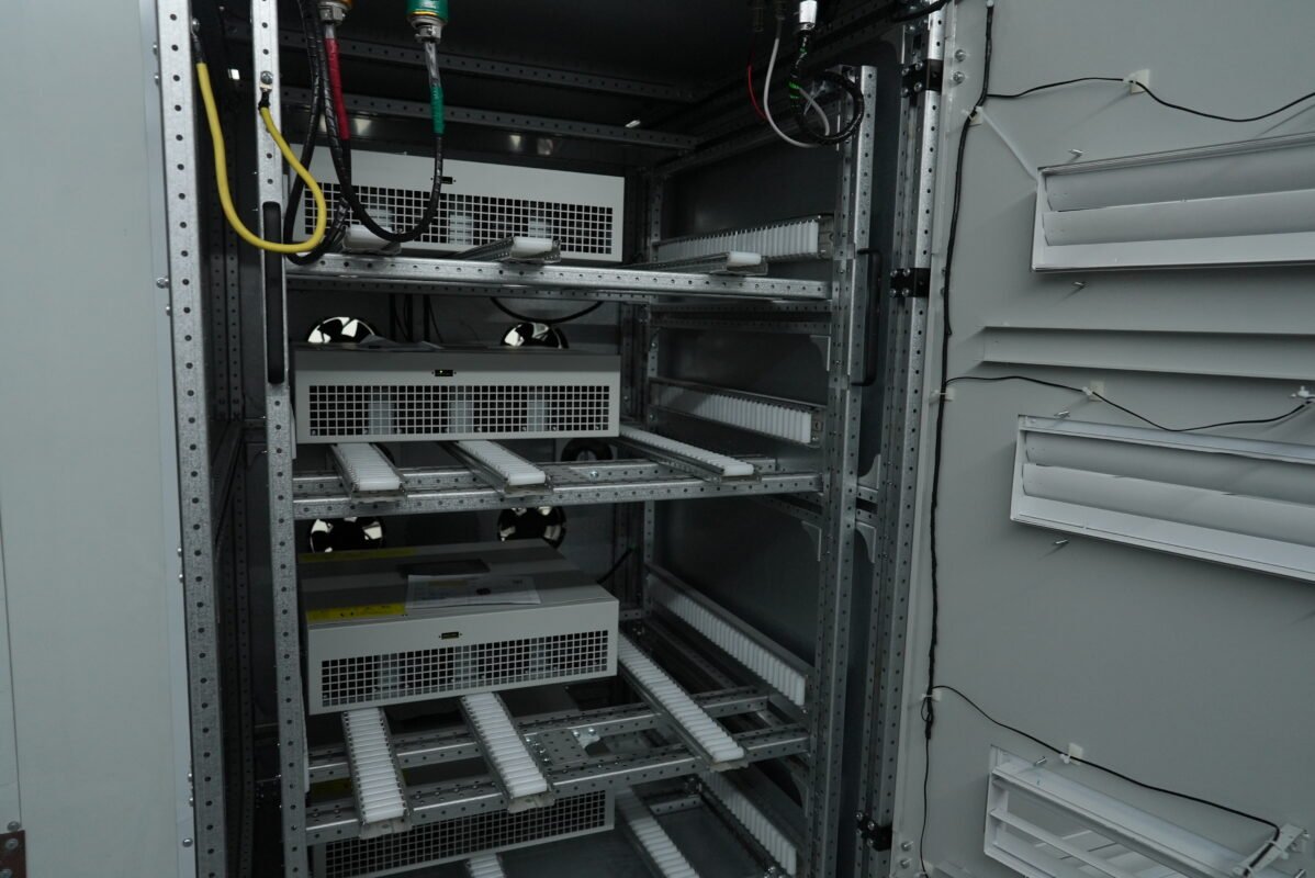 Ikonmac power modules undergoing burn-in testing inside thermal management rack